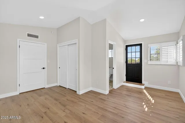 a view of a room with a large window