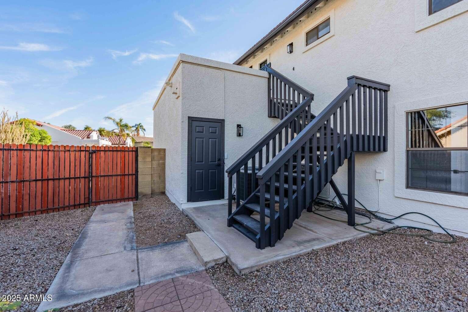 15850 North 15th Way Phoenix, AZ 85022 - Photo 40 of 43 a view of entryway with wooden floor