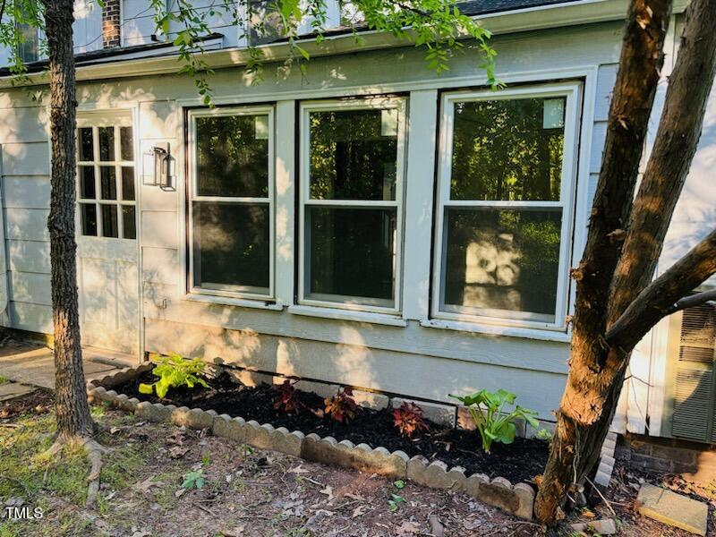 1304 Seaton Road, Unit 24 Durham, NC 27713 - Photo 1 of 38 a front view of a house with a yard