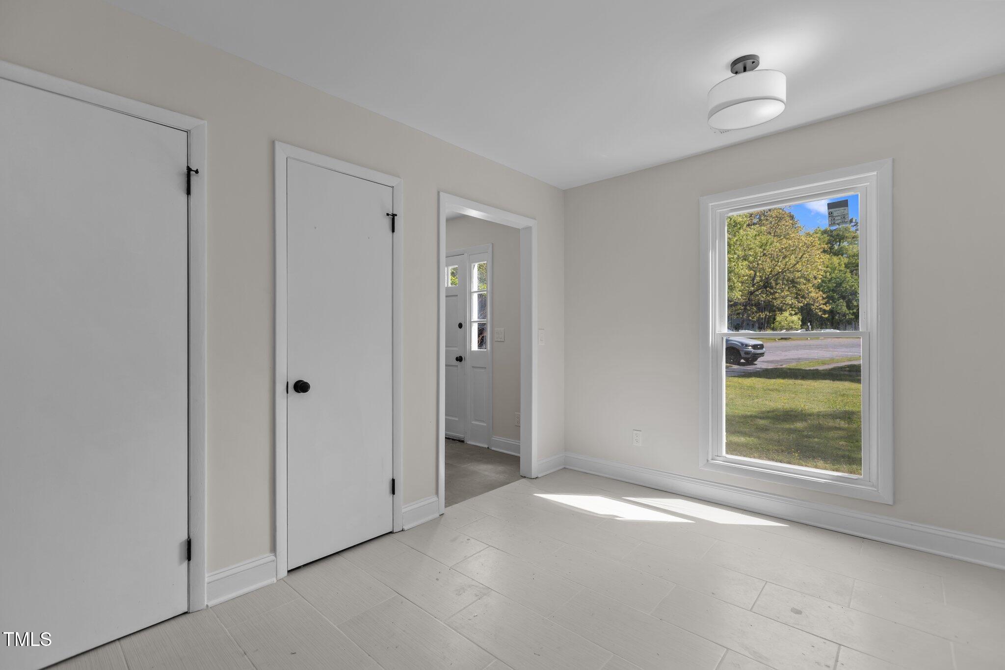1304 Seaton Road, Unit 24 Durham, NC 27713 - Photo 14 of 38 a view of empty room with window