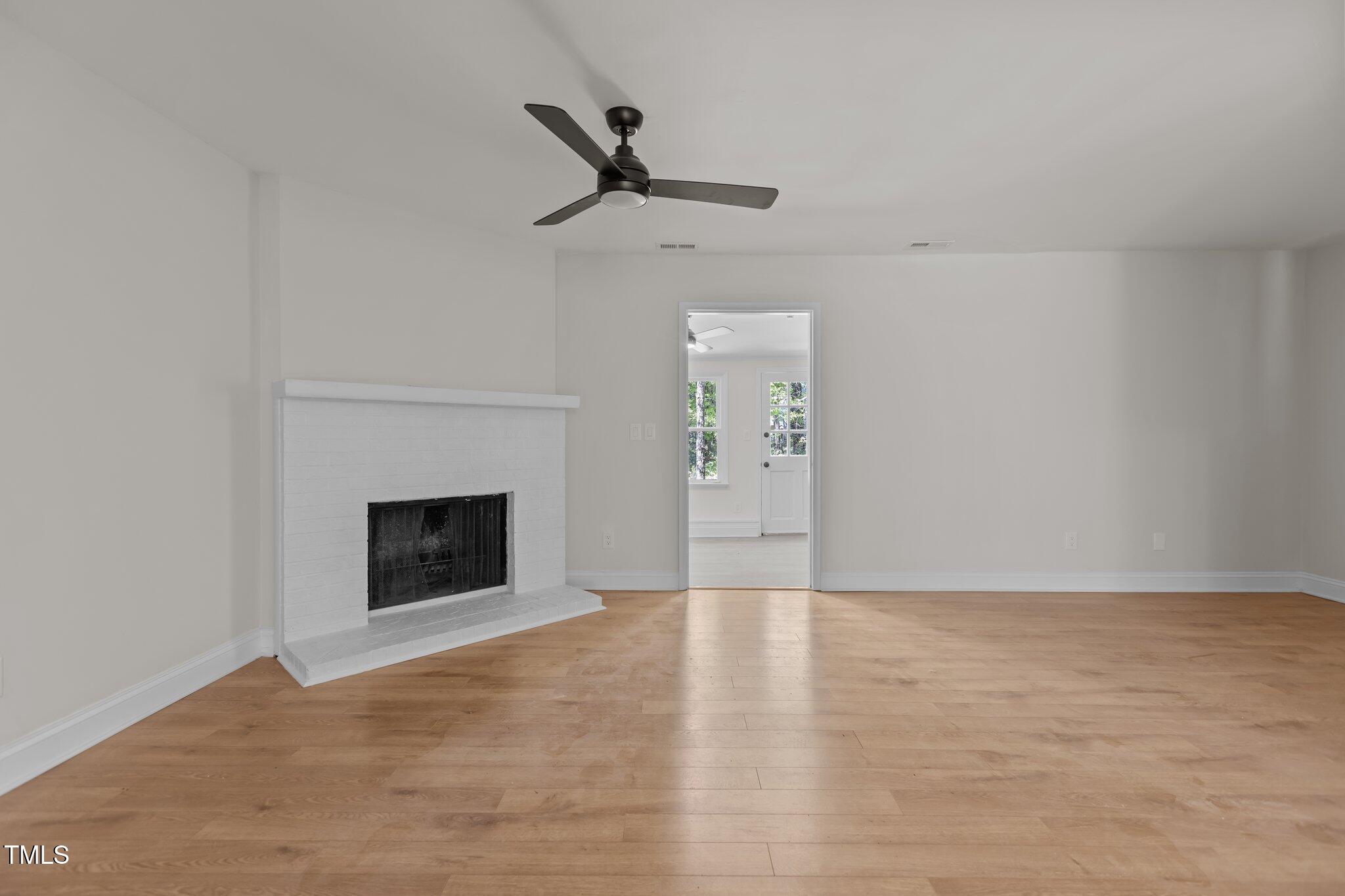 1304 Seaton Road, Unit 24 Durham, NC 27713 - Photo 18 of 38 a view of empty room with a fireplace