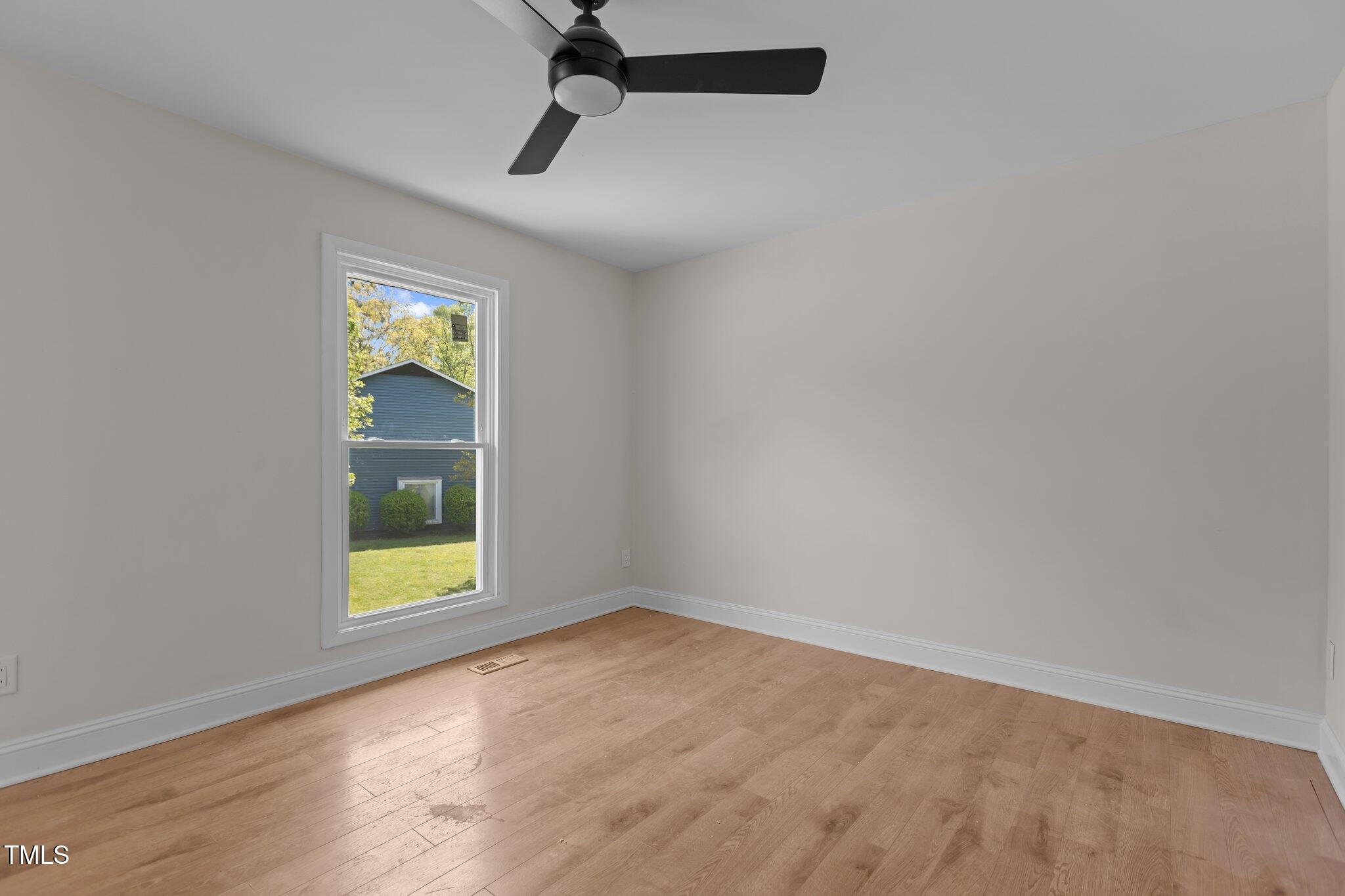 1304 Seaton Road, Unit 24 Durham, NC 27713 - Photo 24 of 38 a view of an empty room and a window