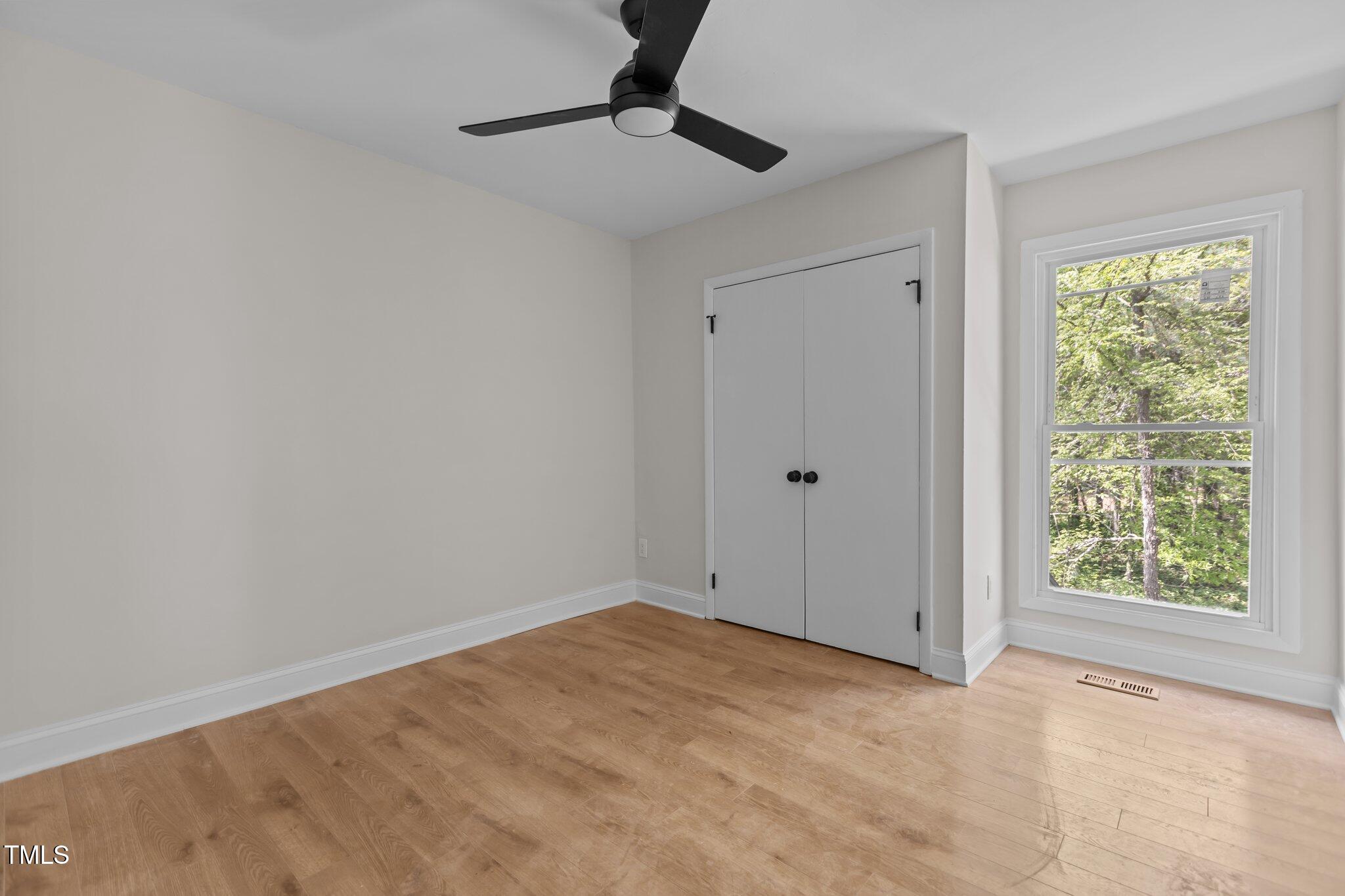 1304 Seaton Road, Unit 24 Durham, NC 27713 - Photo 29 of 38 a view of an empty room with a window