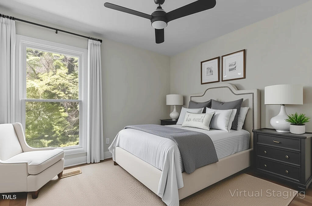 1304 Seaton Road, Unit 24 Durham, NC 27713 - Photo 31 of 38 a bedroom with a bed a couch and a window