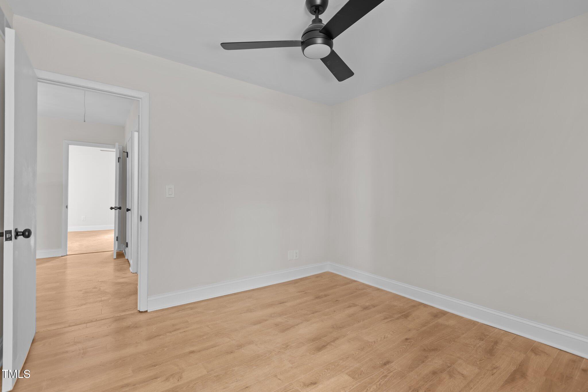1304 Seaton Road, Unit 24 Durham, NC 27713 - Photo 33 of 38 a view of a room with wooden floor