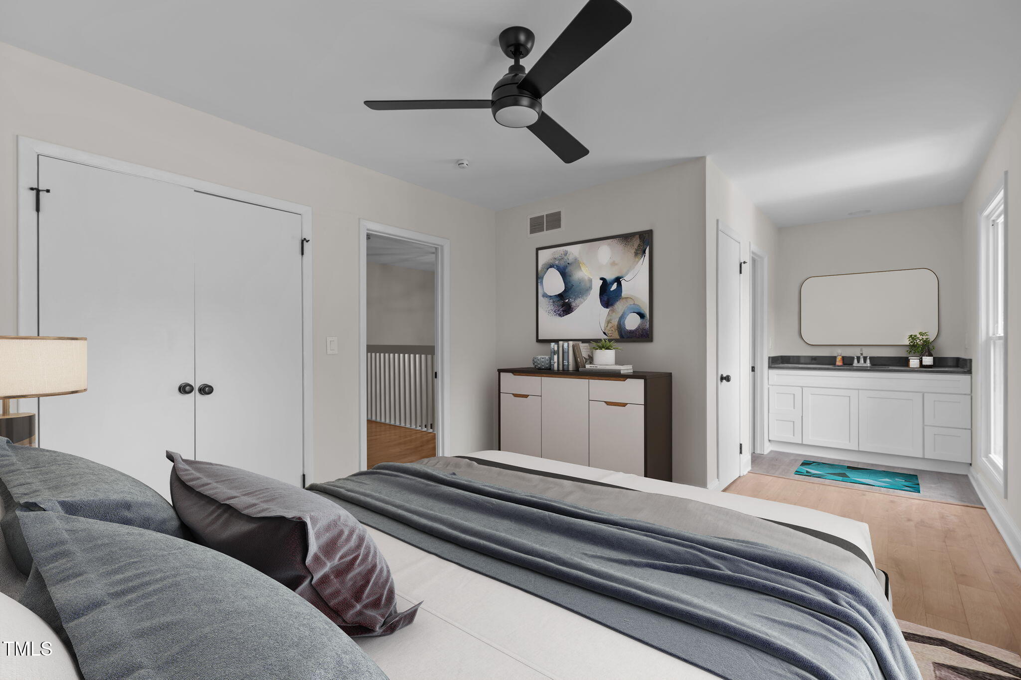 1304 Seaton Road, Unit 24 Durham, NC 27713 - Photo 7 of 38 a bedroom with a bed and cabinets