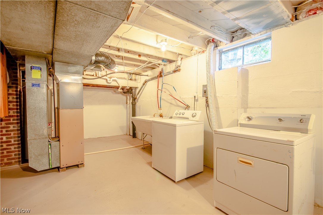 1609 Fairfax Road Akron, OH 44313 - Photo 31 of 35 A huge laundry area with a washer and dryer that stay!