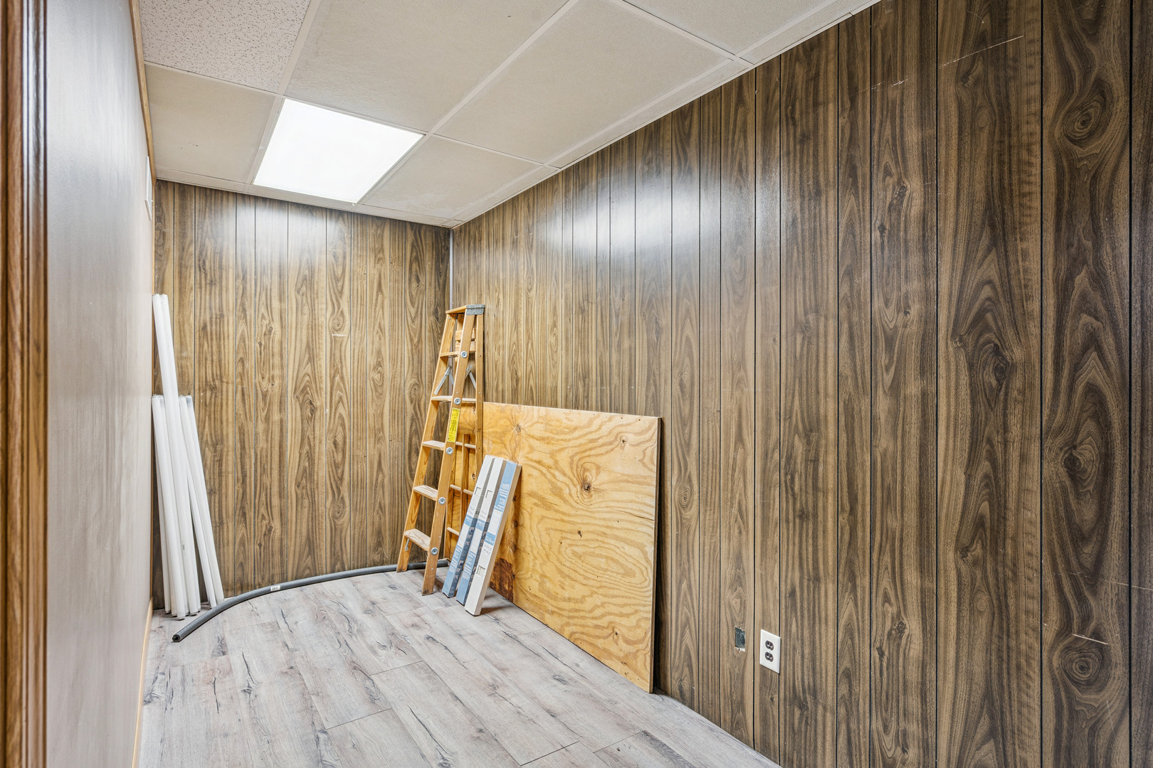 201 North State Street Geneseo, IL 61254 - Photo 12 of 49 a view of a hallway with wooden walls