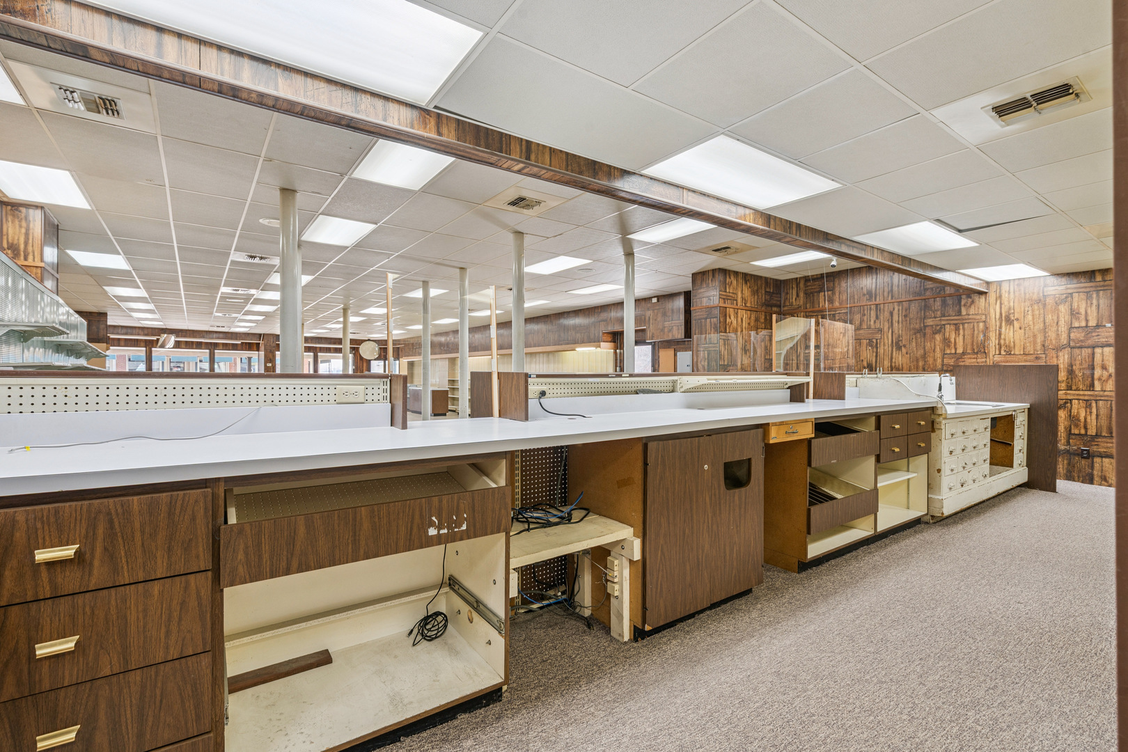 201 North State Street Geneseo, IL 61254 - Photo 17 of 49 a large white kitchen with a stove a sink and dishwasher