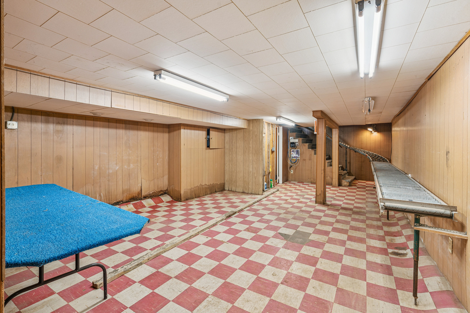 201 North State Street Geneseo, IL 61254 - Photo 18 of 49 a view of a bedroom with a bed and a chair