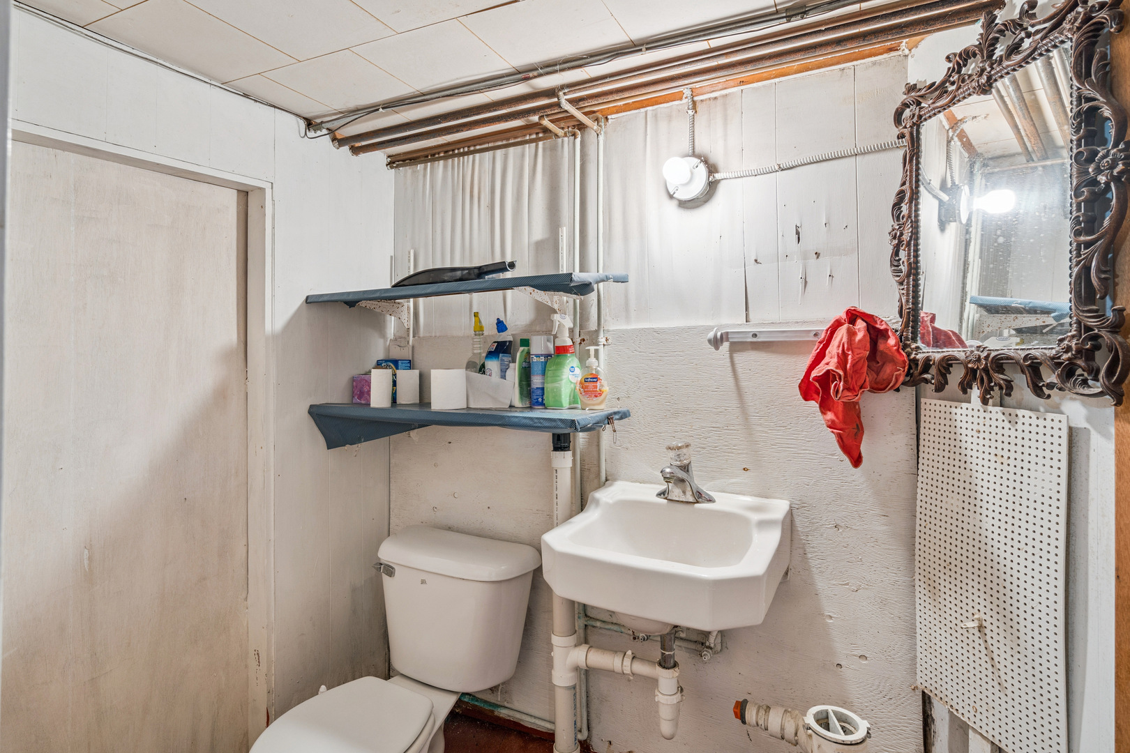201 North State Street Geneseo, IL 61254 - Photo 20 of 49 a bathroom with a sink toilet and shower