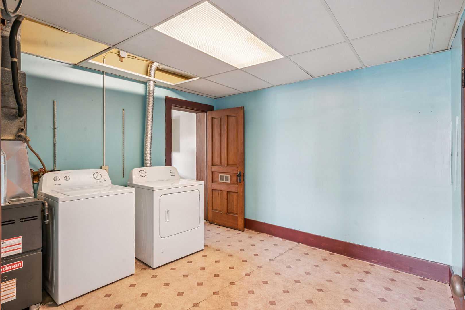 201 North State Street Geneseo, IL 61254 - Photo 23 of 49 a storage room with a washer and dryer
