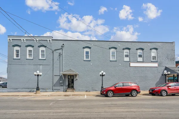 a cars parked in front of a building
