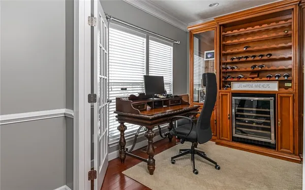 a bedroom with a bed and a couch