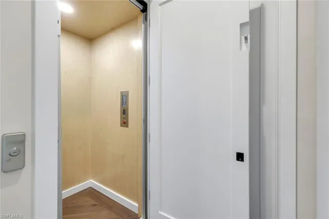 a spacious bedroom with a bed and a couch