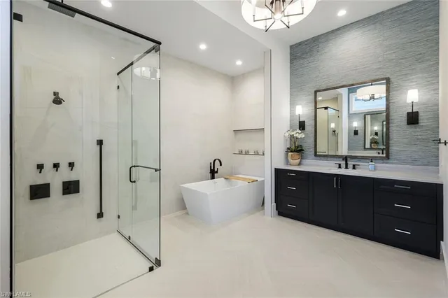 a kitchen with a sink and refrigerator