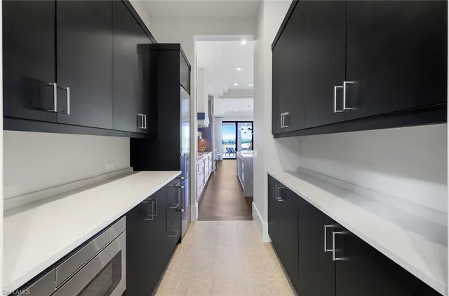 a bathroom with a sink a mirror and vanity