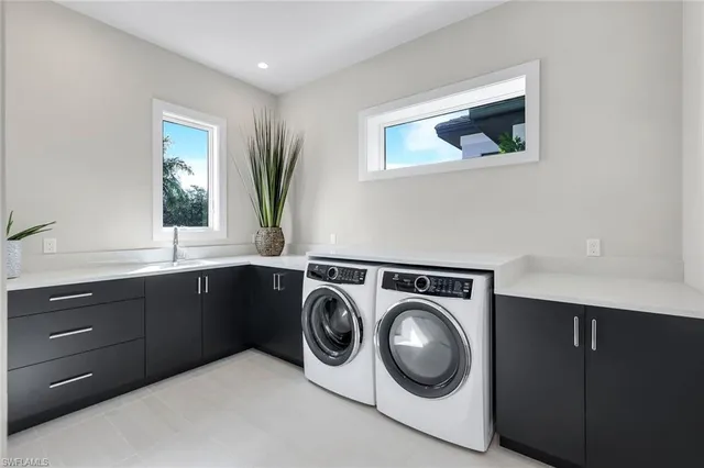 a bathroom with a sink vanity and a mirror