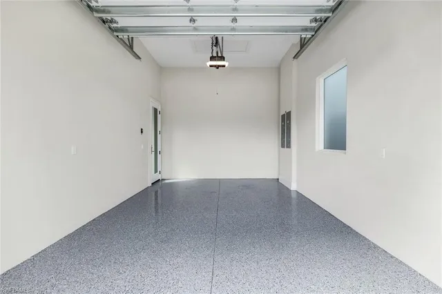 a dining room with furniture wooden floor and a potted plant