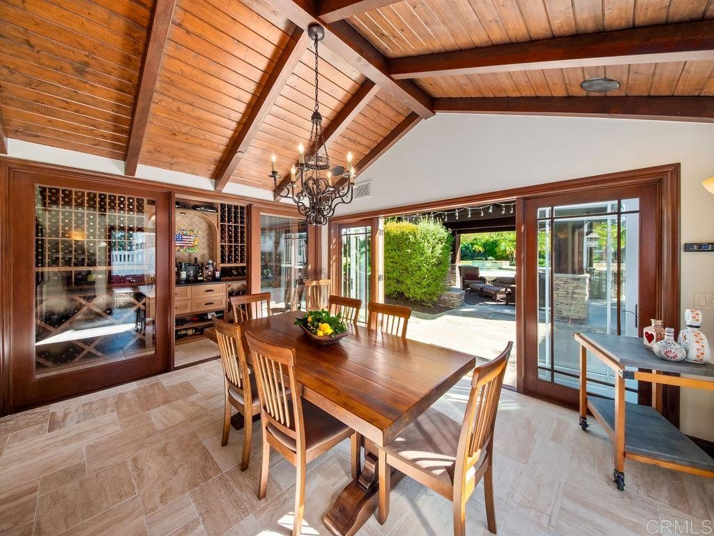 2906 Wishbone Way Encinitas, CA 92024 - Photo 12 of 13 a dining room with furniture water view and balcony