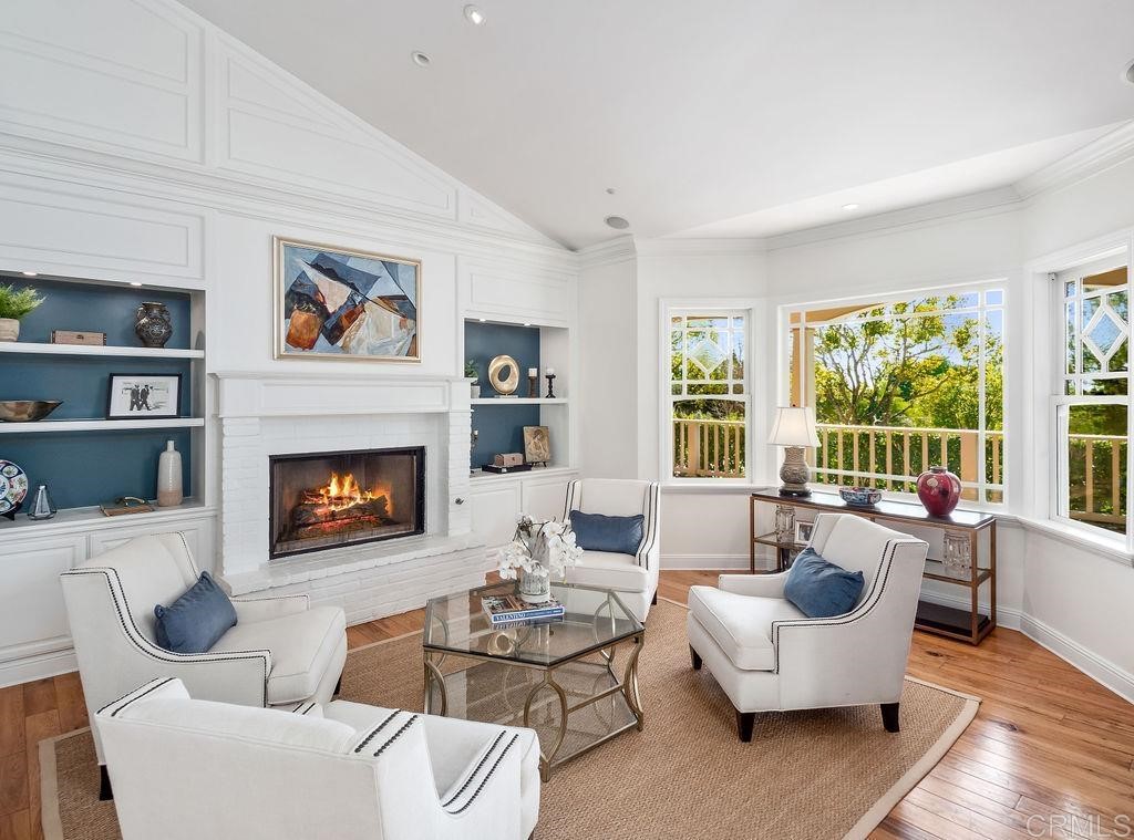 2906 Wishbone Way Encinitas, CA 92024 - Photo 4 of 13 a living room with furniture and a fireplace