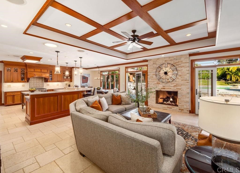 2906 Wishbone Way Encinitas, CA 92024 - Photo 9 of 13 a living room with furniture and a fireplace