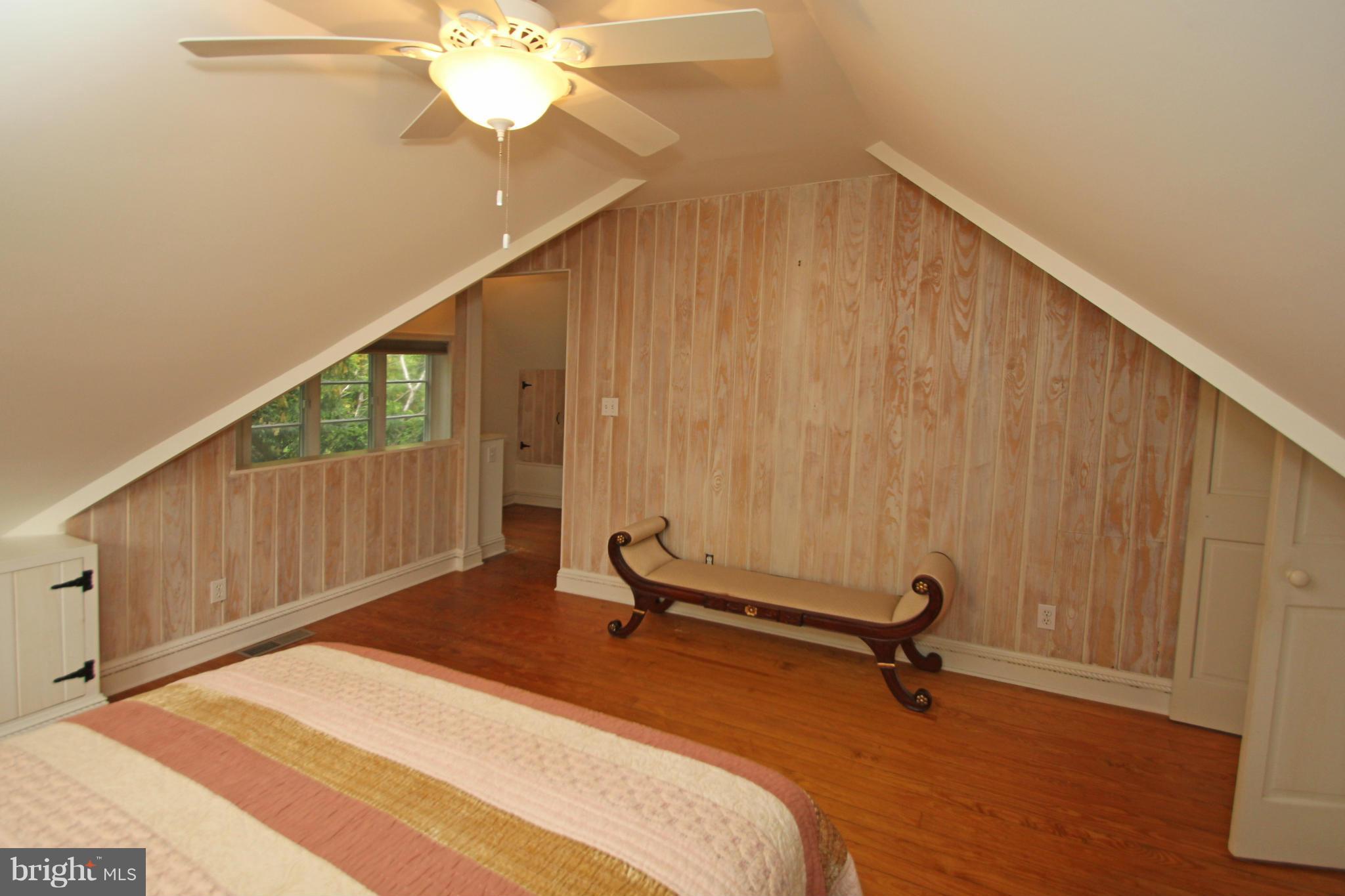 21 Sussex Road Silver Spring, MD 20910 - Photo 17 of 30 a view of a room with a window and a ceiling fan