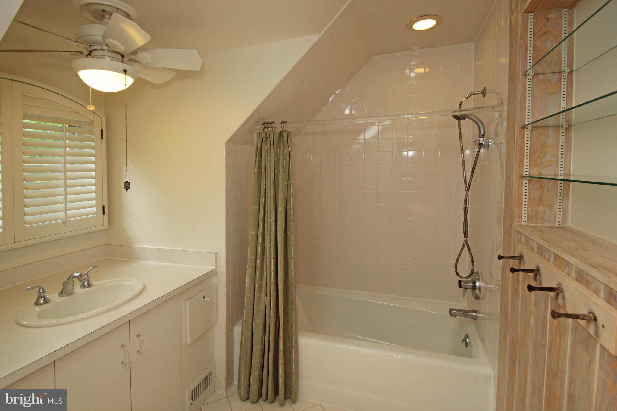 21 Sussex Road Silver Spring, MD 20910 - Photo 18 of 30 a bathroom with a sink mirror toilet and bathtub
