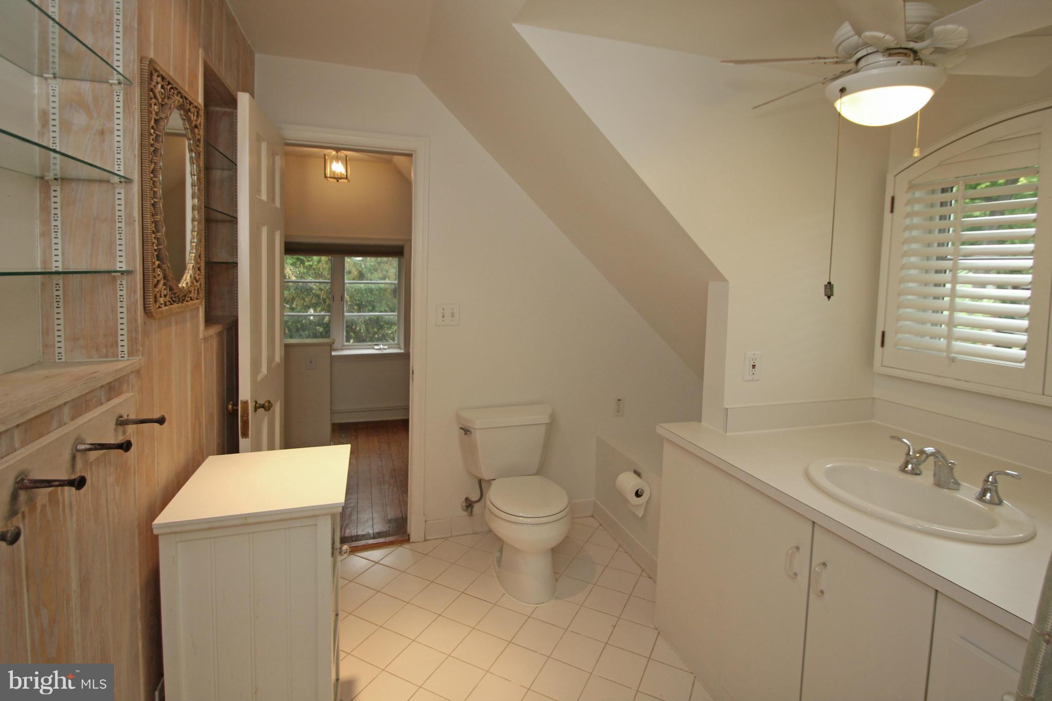21 Sussex Road Silver Spring, MD 20910 - Photo 19 of 30 a bathroom with a sink a toilet and shower