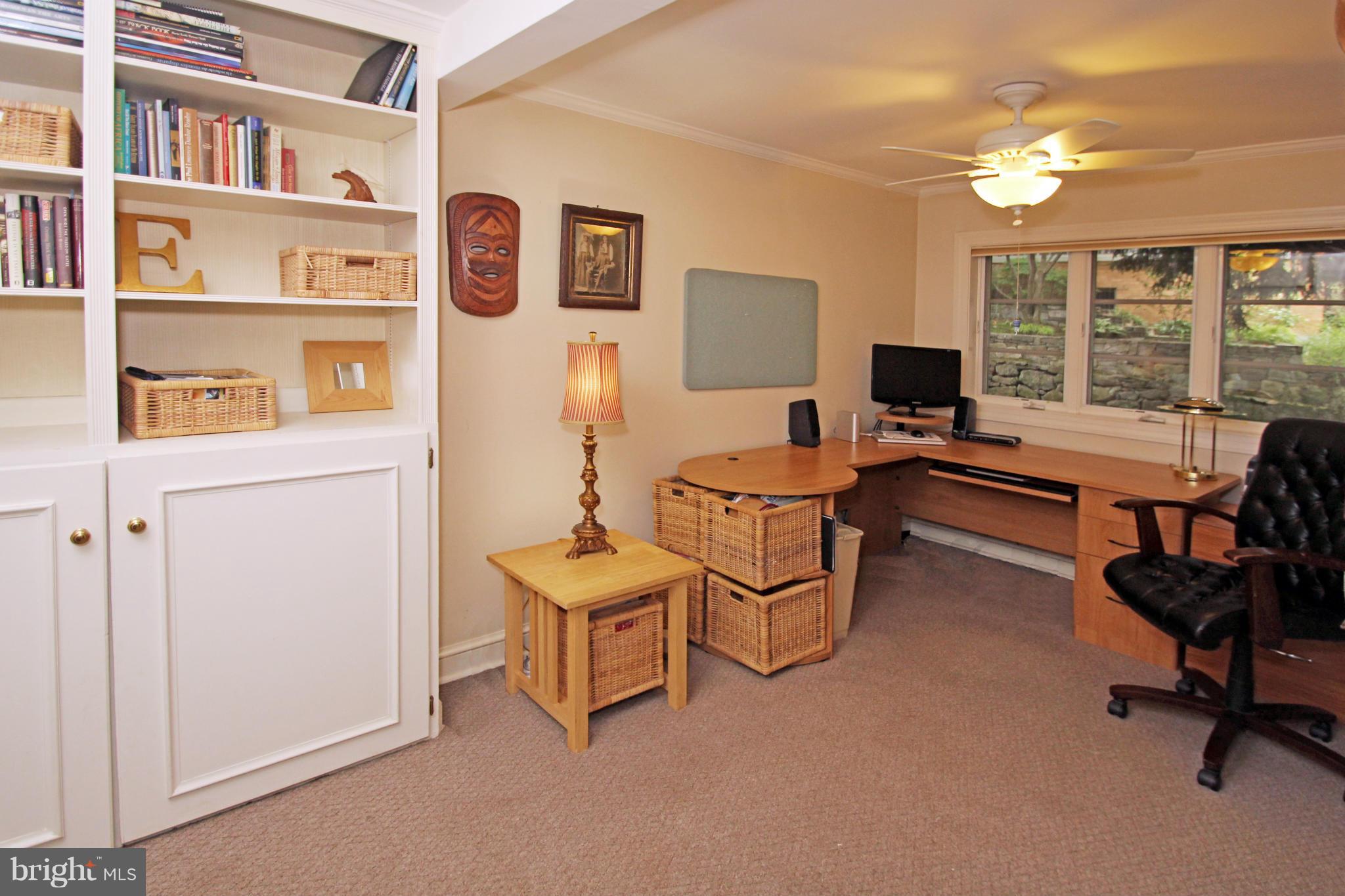 21 Sussex Road Silver Spring, MD 20910 - Photo 21 of 30 a living room with furniture and a workspace