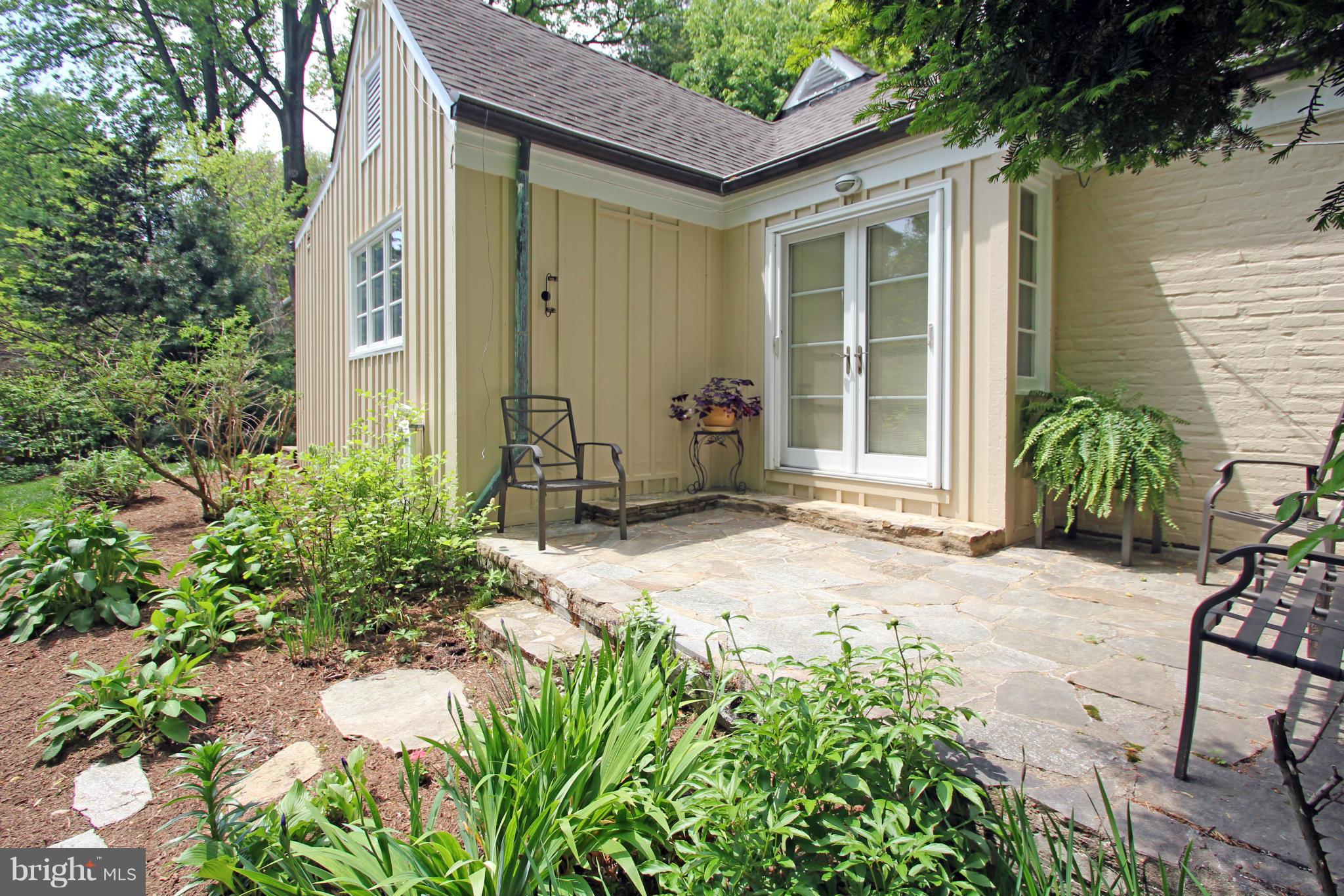 21 Sussex Road Silver Spring, MD 20910 - Photo 24 of 30 a front view of a house with a yard and potted plants