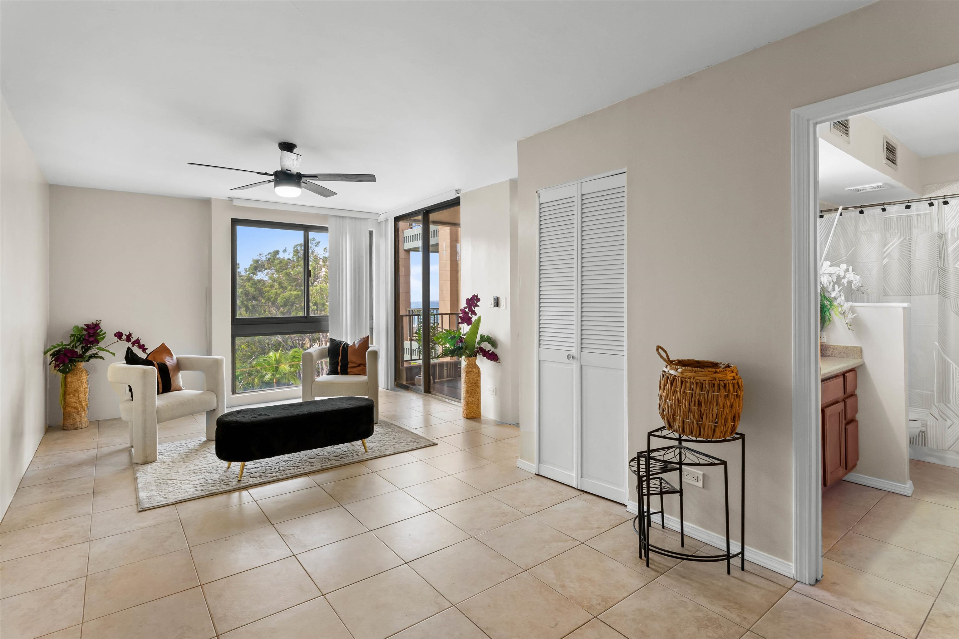 4310 Lower Honoapiilani Road, Unit 609 Lahaina, HI 96761 - Photo 2 of 29 a living room with furniture and a window