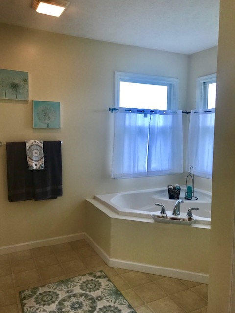 237 Kiddsville Road Fishersville, VA 22939 - Photo 21 of 46 a kitchen with a sink and a cabinets