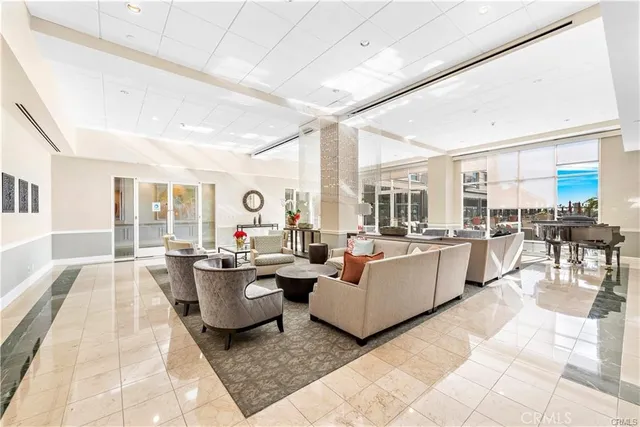 a view of a chairs and tables in a patio