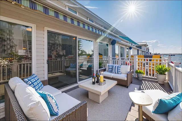 a kitchen with cabinets appliances a sink and a window