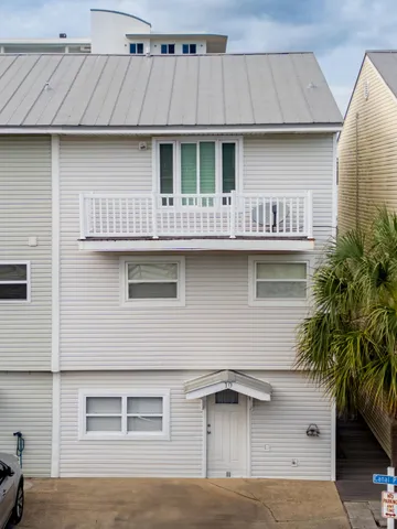 a front view of a house with balcony