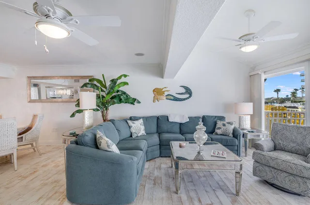 a bedroom with a large bed and a dresser