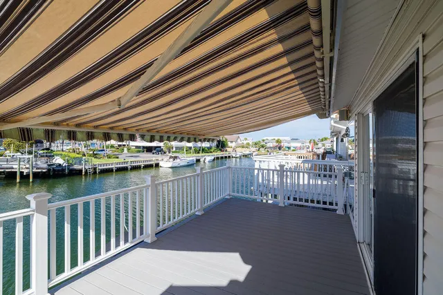 a bedroom with a bed and a table in it