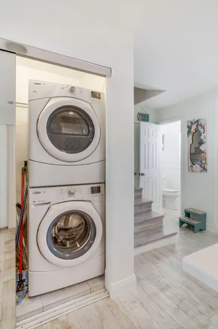 a bathroom with a shower and a sink