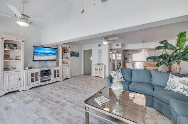 a kitchen with granite countertop a refrigerator and a stove