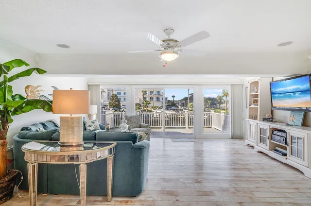 a view of storage and utility room with wooden floor