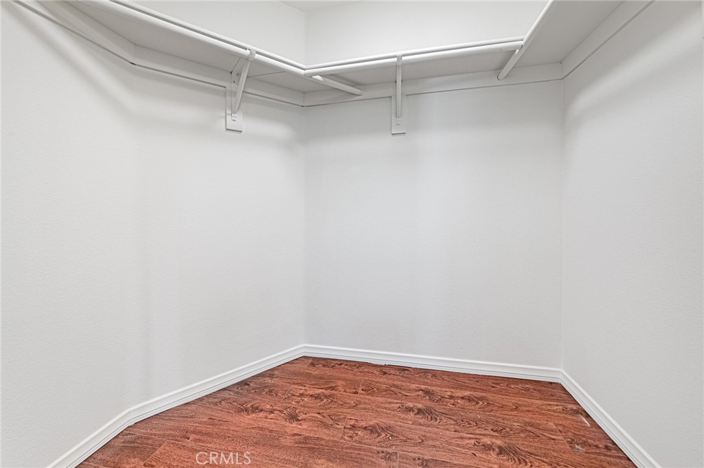 15377 Tobarra Road Fontana, CA 92337 - Photo 22 of 38 Spacious walk-in closet offering ample storage space