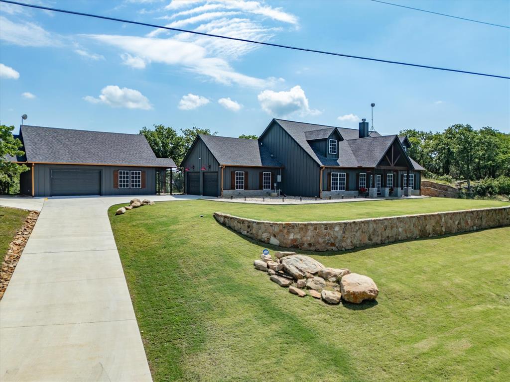 117 Ranchview Court Bowie, TX 76230 - Photo 35 of 40 a view of a house with backyard