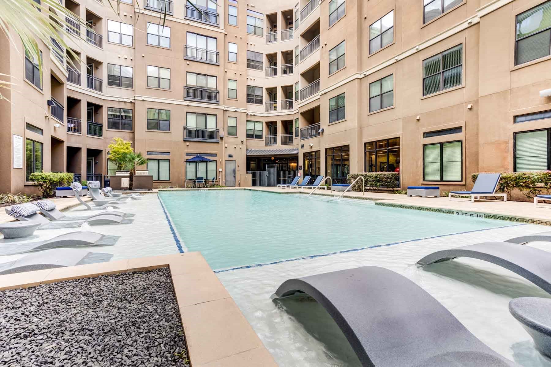 2525 McCue Road, Unit 519 Houston, TX 77056 - Photo 11 of 15 a view of a building and a street