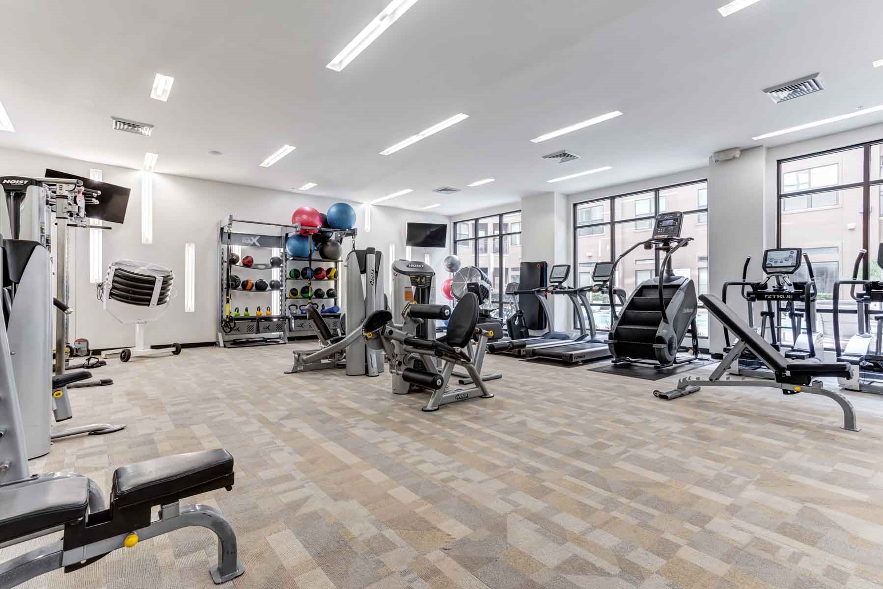 2525 McCue Road, Unit 519 Houston, TX 77056 - Photo 14 of 15 a view of a room with gym equipment