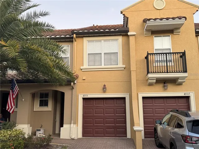 a front view of a house with parking