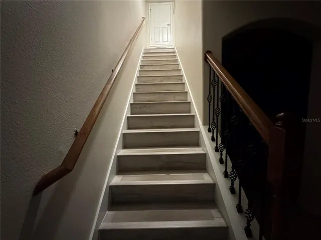 a view of hallway with stairs