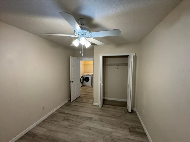 a bathroom with a sink toilet and mirror