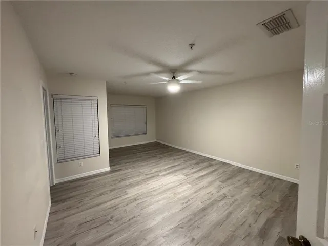 a view of storage and utility room with racks on the wall