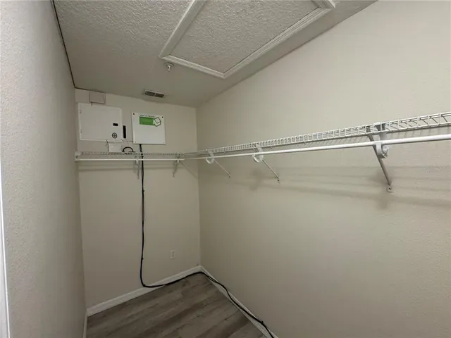 a large bathroom with a sink and mirror